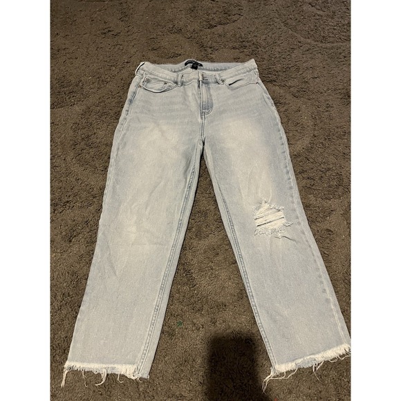 Calvin Klein Denim - Calvin Klein Distressed Light Wash Jeans with Frayed Hem Size 14
